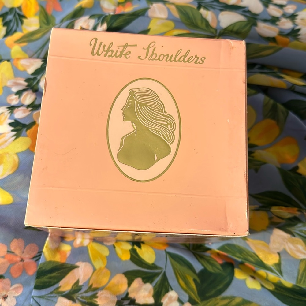 White shoulders bath powder